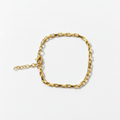 Gold paperclip chain bracelet on white background, product photo
